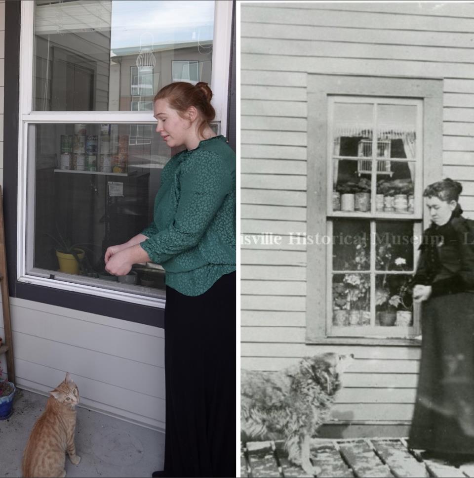 Woman looking down at cat