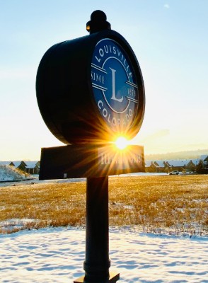 Louisville wayfinding sign at sunrise