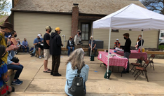 A photo of people gathered to hear instructions for the Lenses on Louisville Events